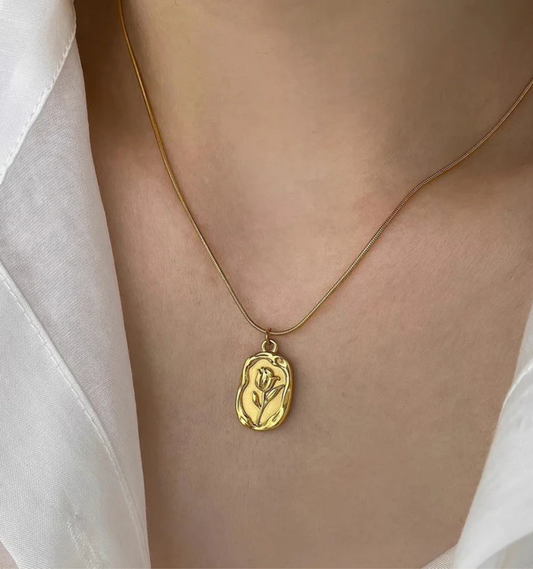Gold Plated Floral Seal Pendant With Chain