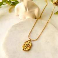 Gold Plated Floral Seal Pendant With Chain