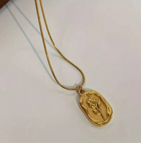 Gold Plated Floral Seal Pendant With Chain